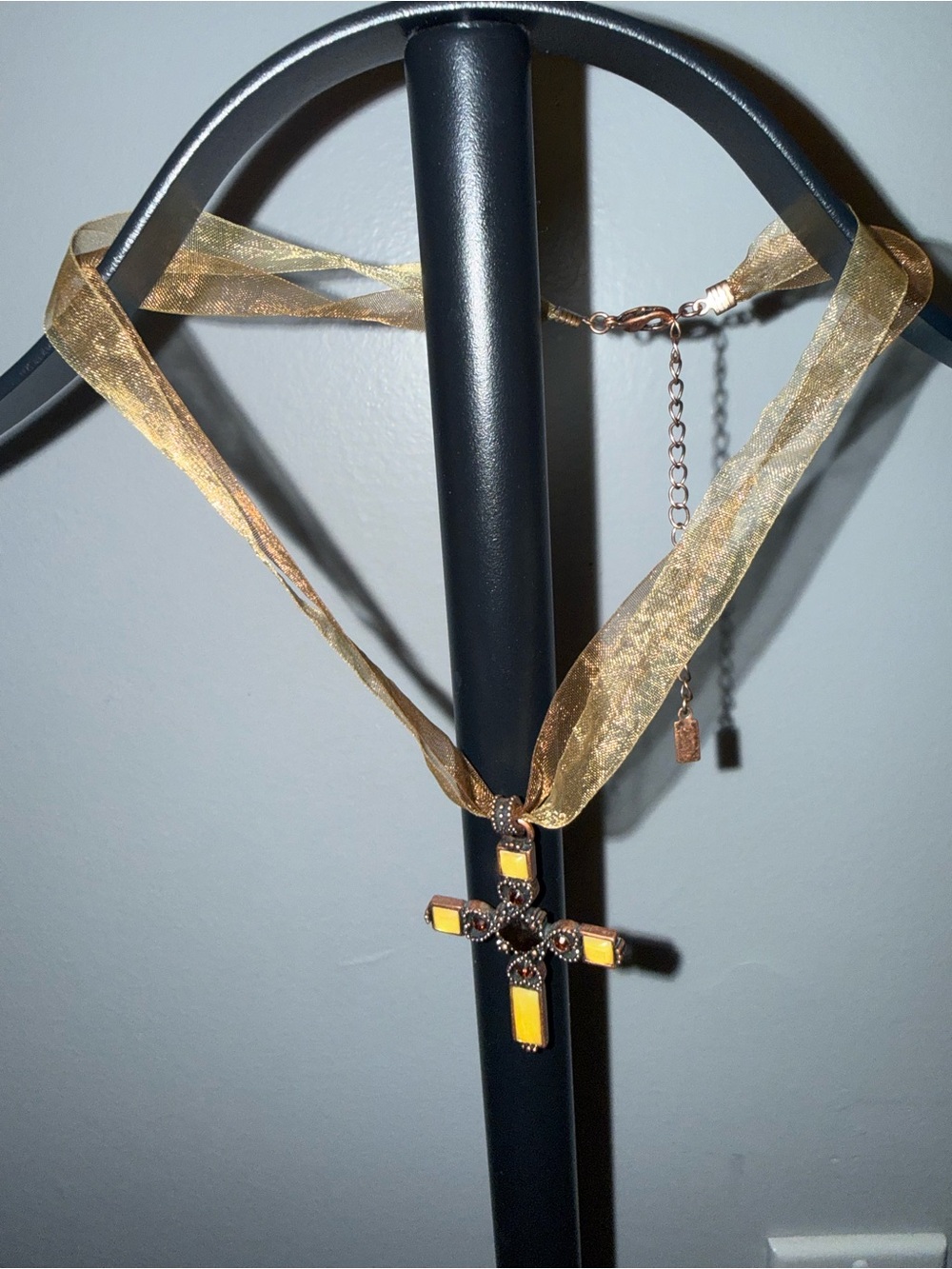 1928 Gold Ribbon Cross Necklace with Yellow Accents